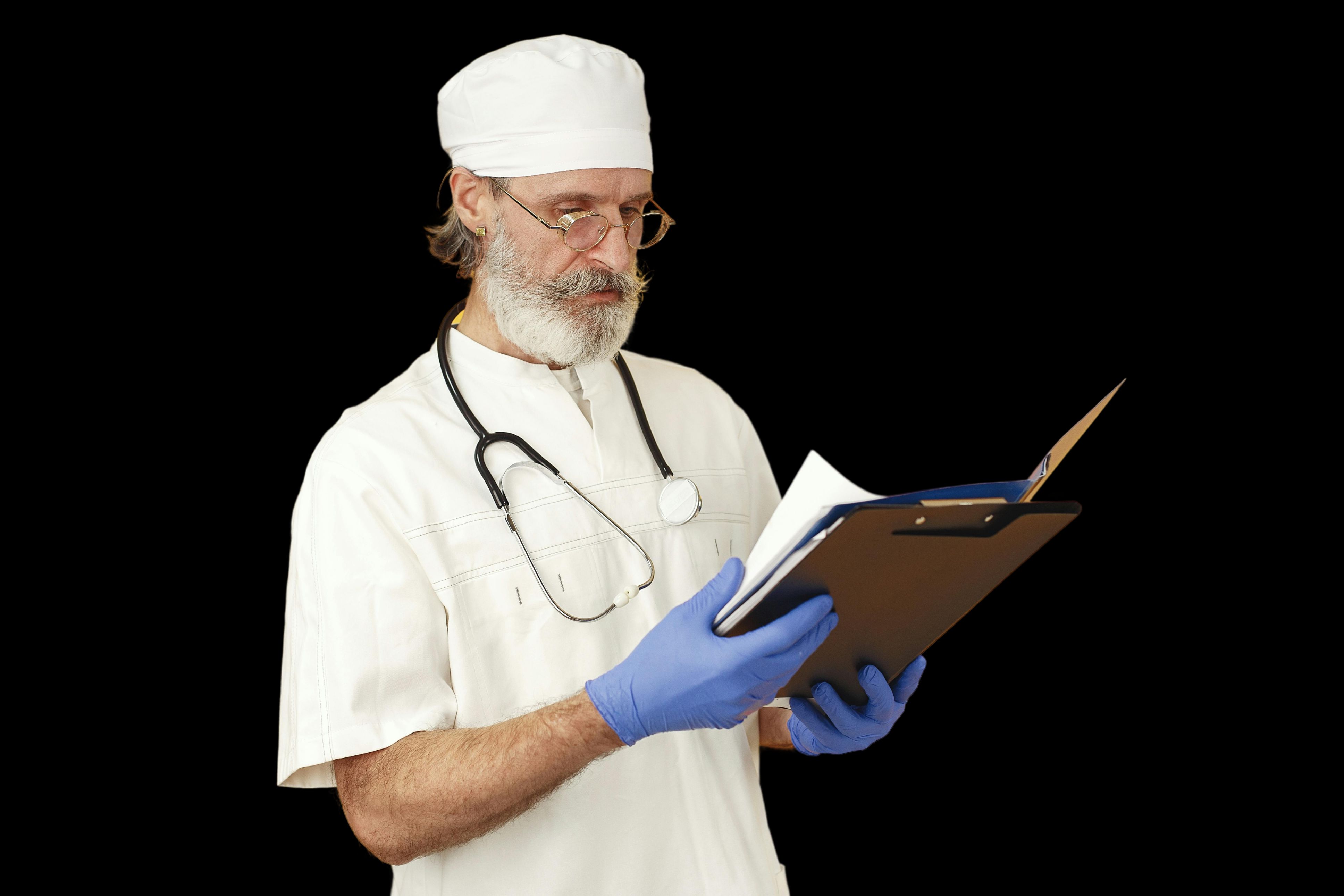 Doctor reviewing medical information on a tablet